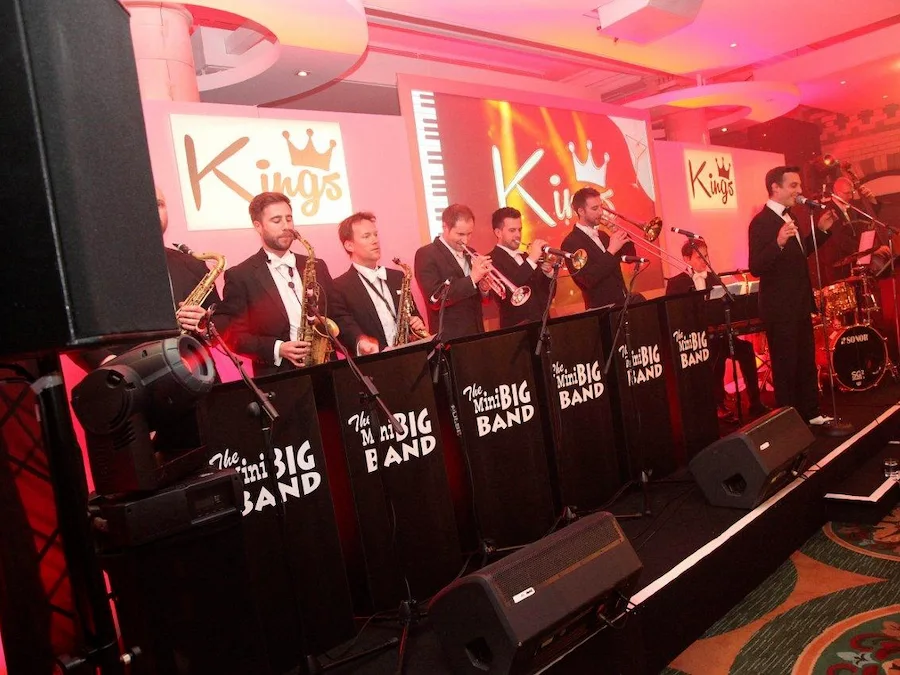 Mini Big Band performing live with professional PA sound system and stage lighting at the Palace Hotel Manchester